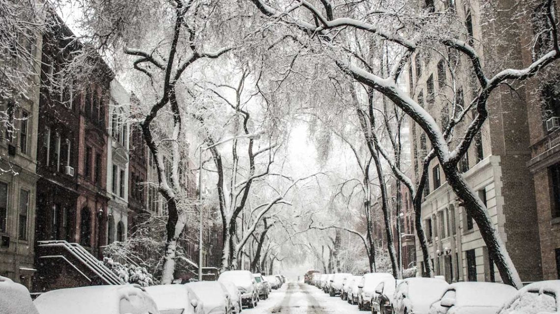 snowy road where sleeping bags would help the homeless