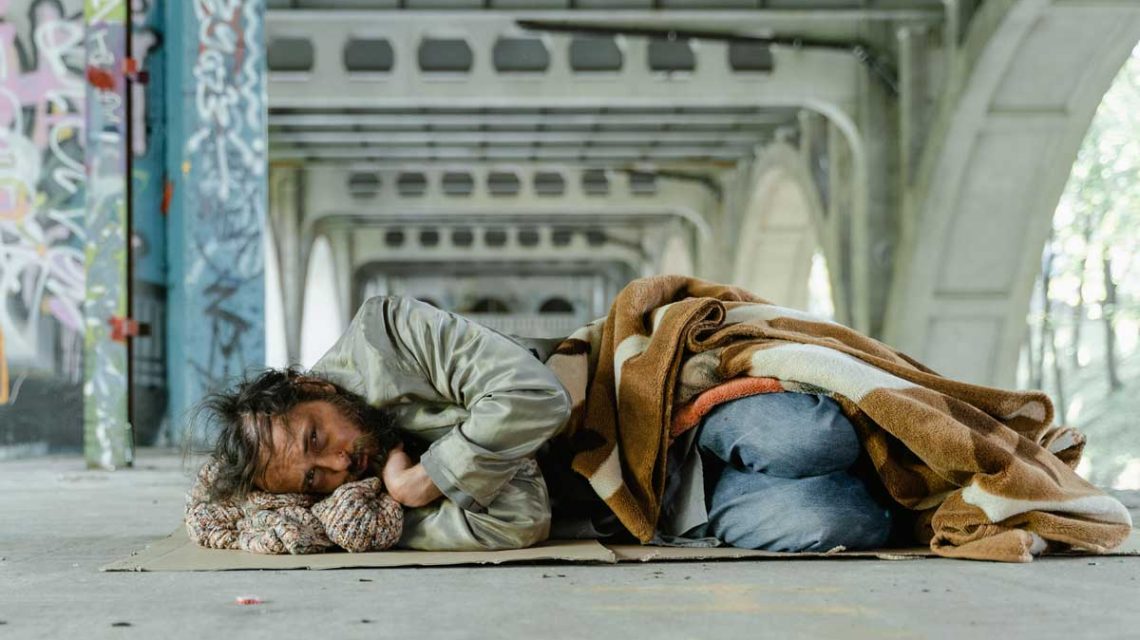 homeless man needing warmth